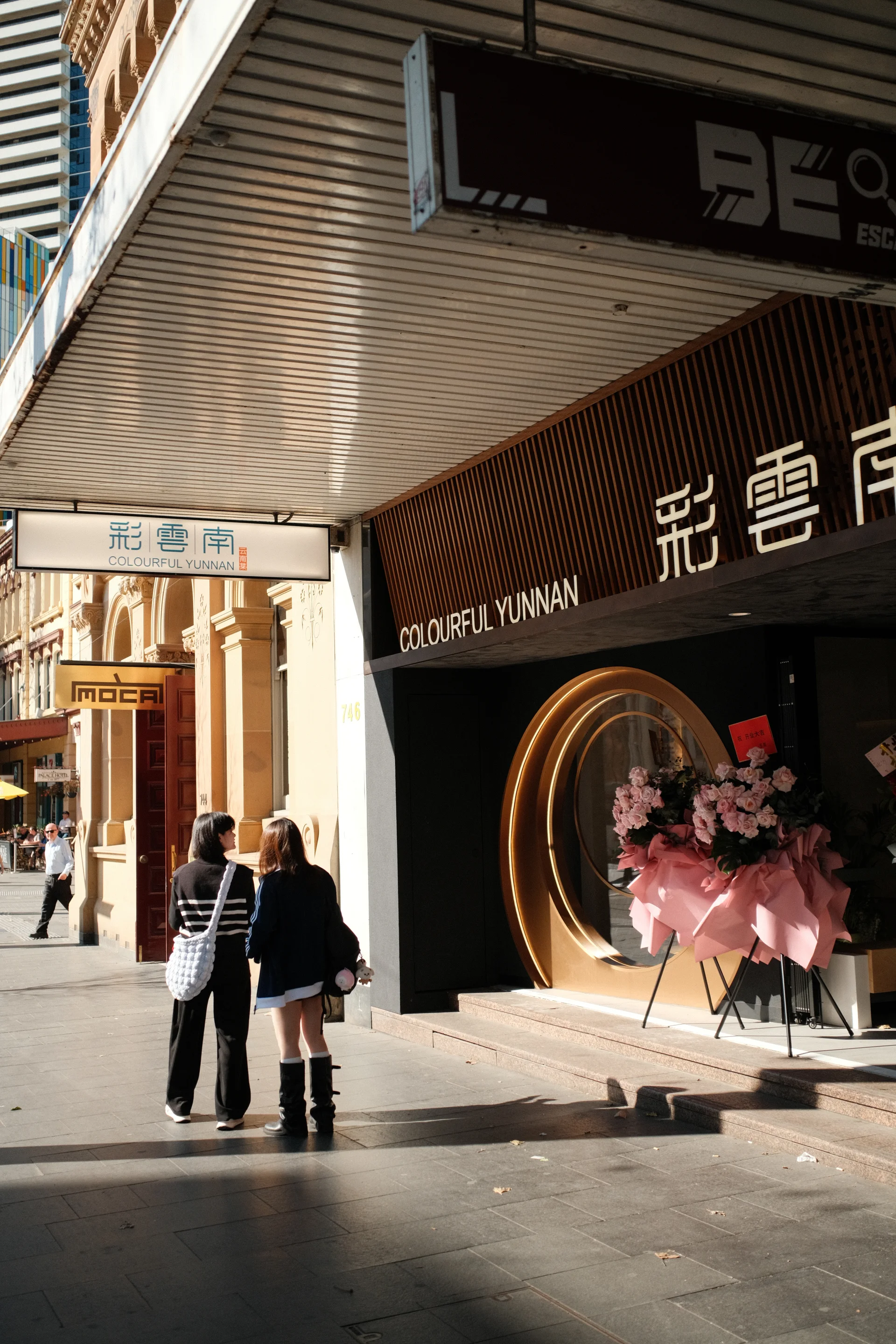 Pedestrians outside Colourful Yunnan restaurant in Sydney